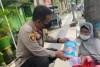 Kapolres Lamongan Gelar Gerakan Humanis Polisi Peduli Berbagi Sembako kepada Disabilitas
